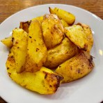 Картофельные дольки запеченные фото